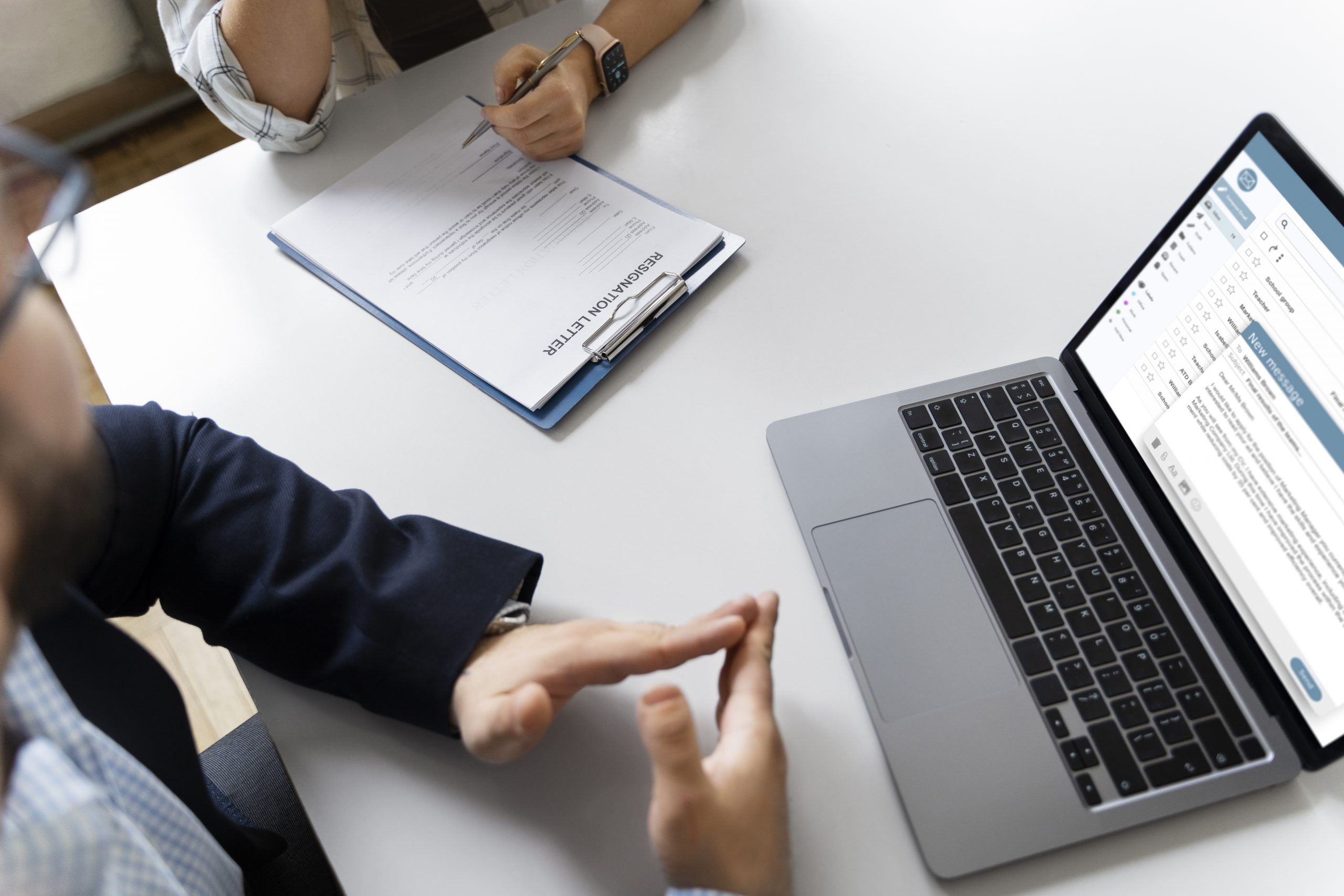 Business owner reviewing tax documents and paperwork.