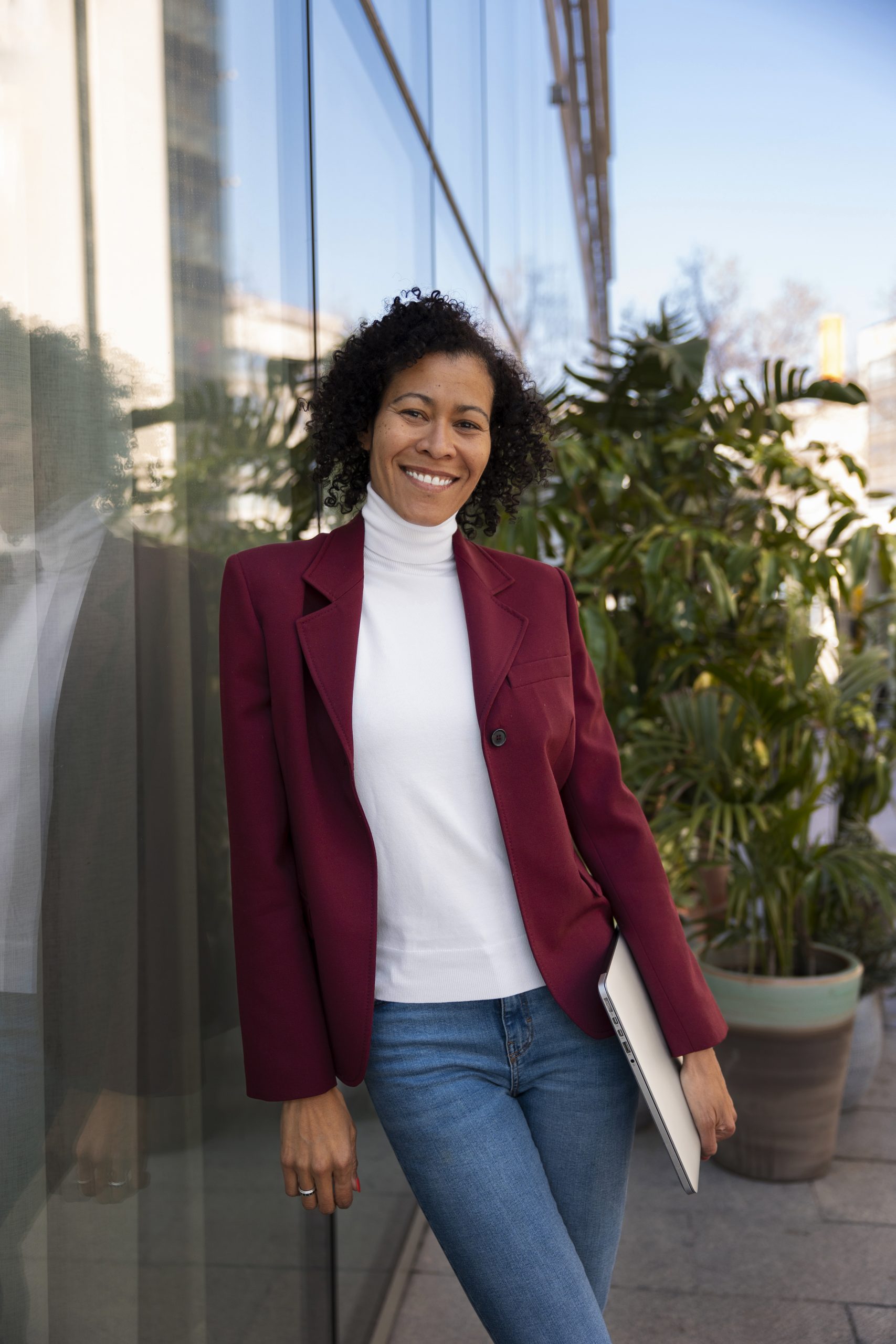 Real estate investor reviewing bookkeeping and financial reports on a laptop.