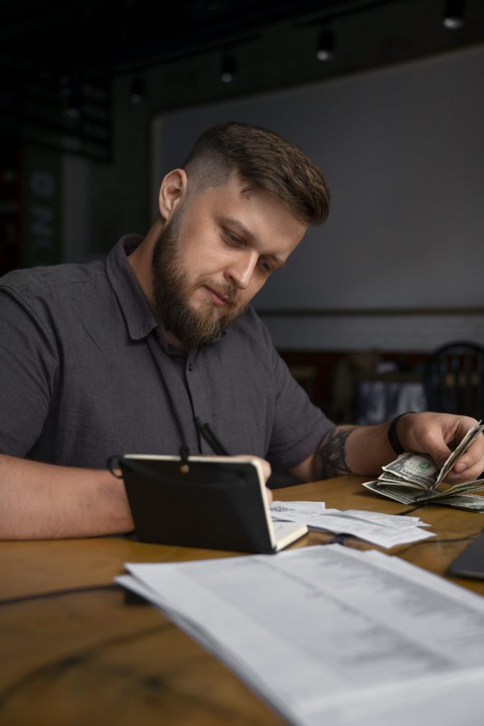 Professional business owner working in a modern environment, representing multi-member LLC tax compliance and partnership rules.